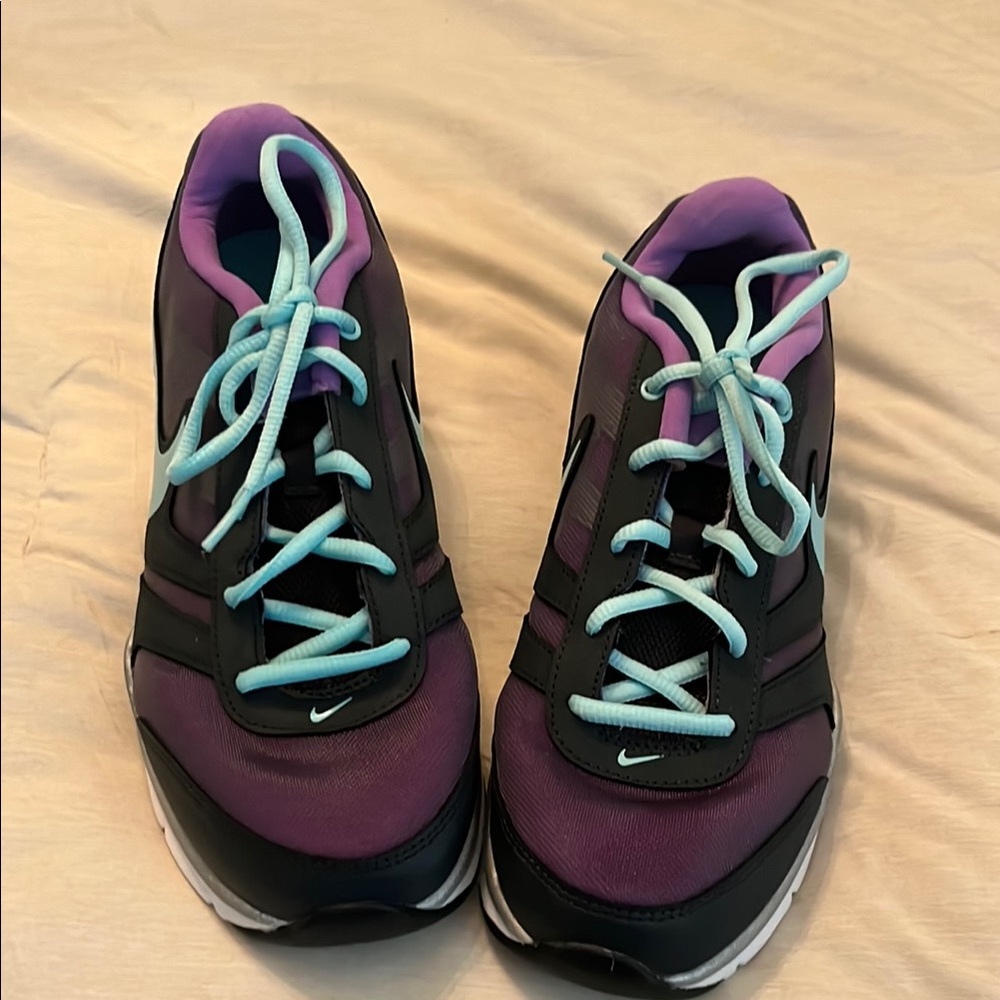 Nike Purple and Black Athletic Shoes with Striking Design